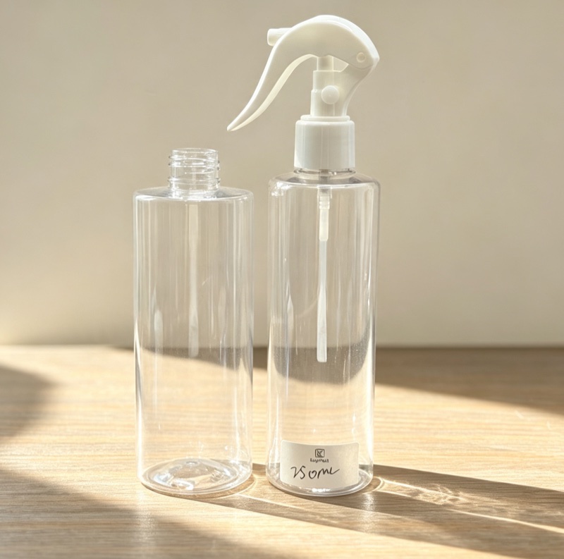 Two clear 250ml bottles, one with white trigger sprayer and one open